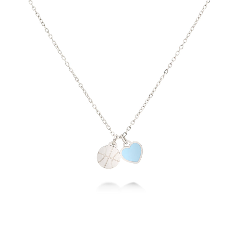 Silver basketball charm necklace with engraved basketball pendant and light blue heart charm on a thin chain