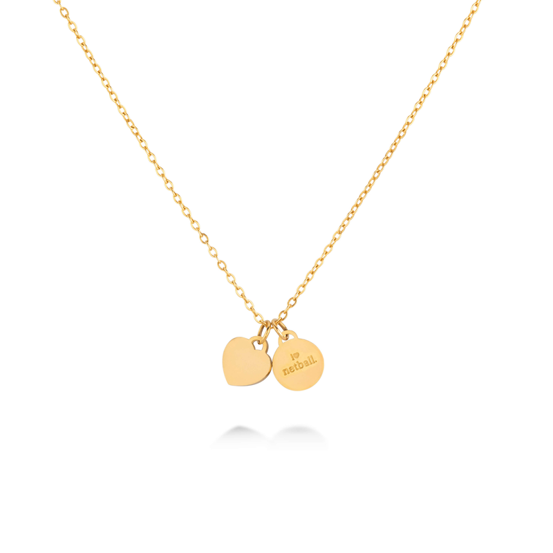 Back view of Gold Love of the Game netball necklace showing charm with I Love Netball engraving