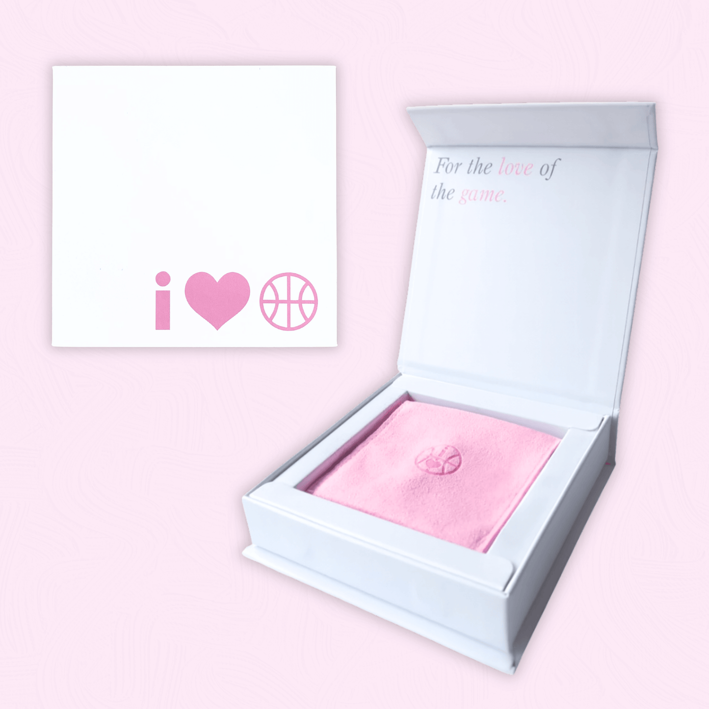 Open white jewellery box with pink insert and I Heart Hoops basketball branding
