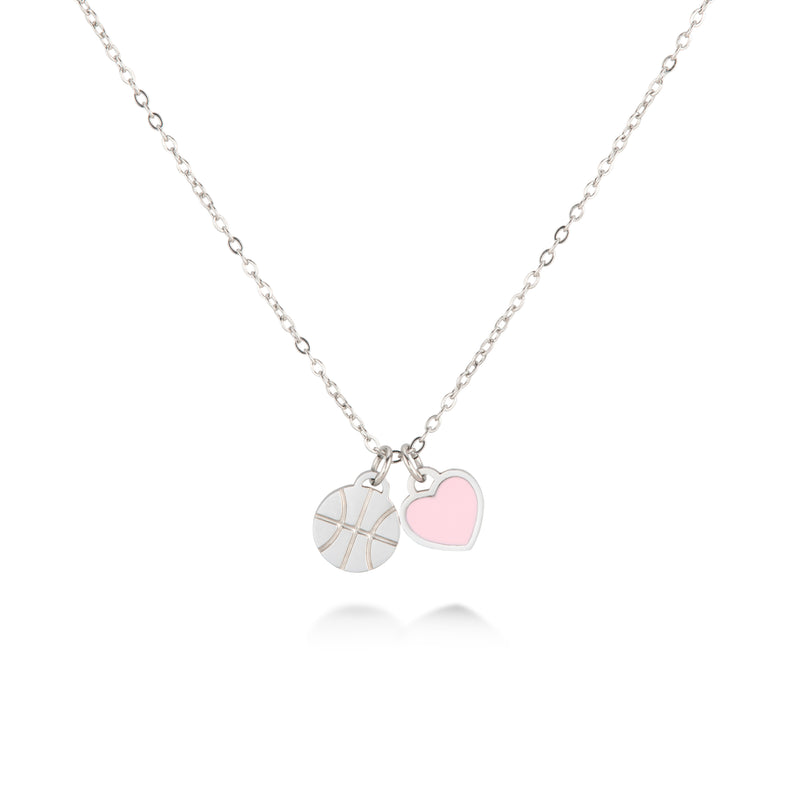 Silver basketball charm necklace with engraved basketball pendant and pink heart charm on a thin chain