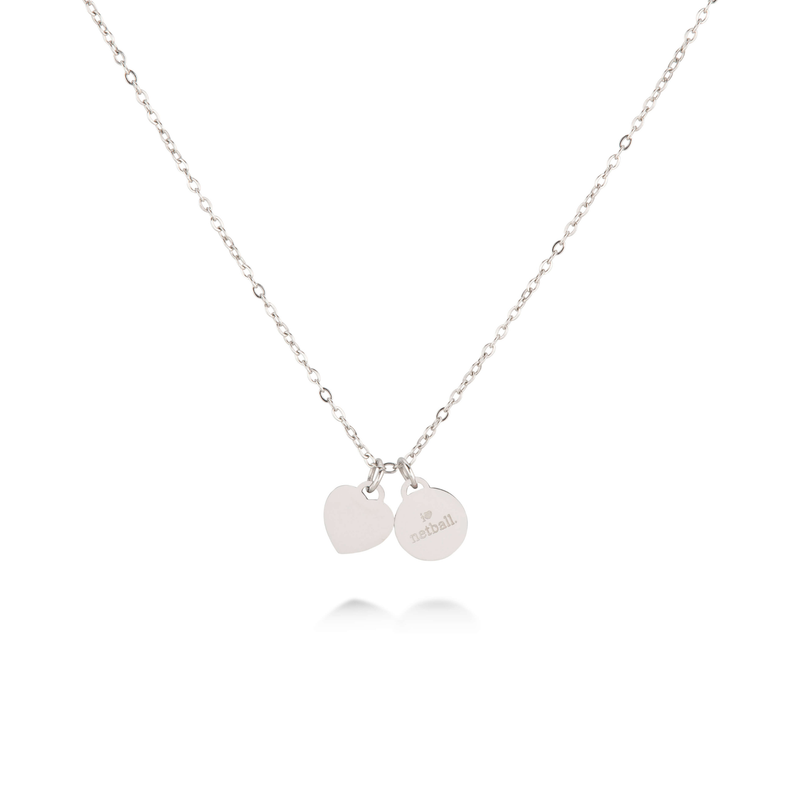 Back view of Silver Love of the Game netball necklace showing charm with I Love Netball engraving