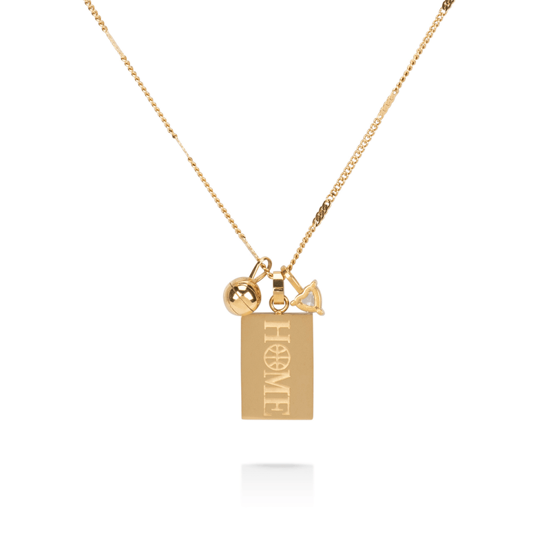Back view of gold basketball court necklace showing engraved HOME plate with basketball and heart charms on chain