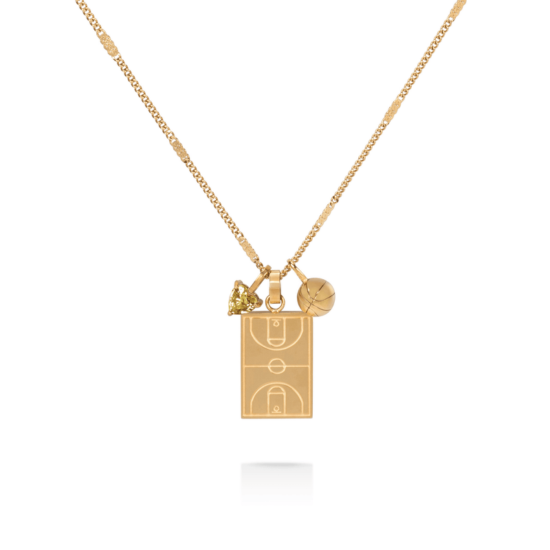 Gold basketball court pendant necklace with basketball charm and yellow heart gem on a chain