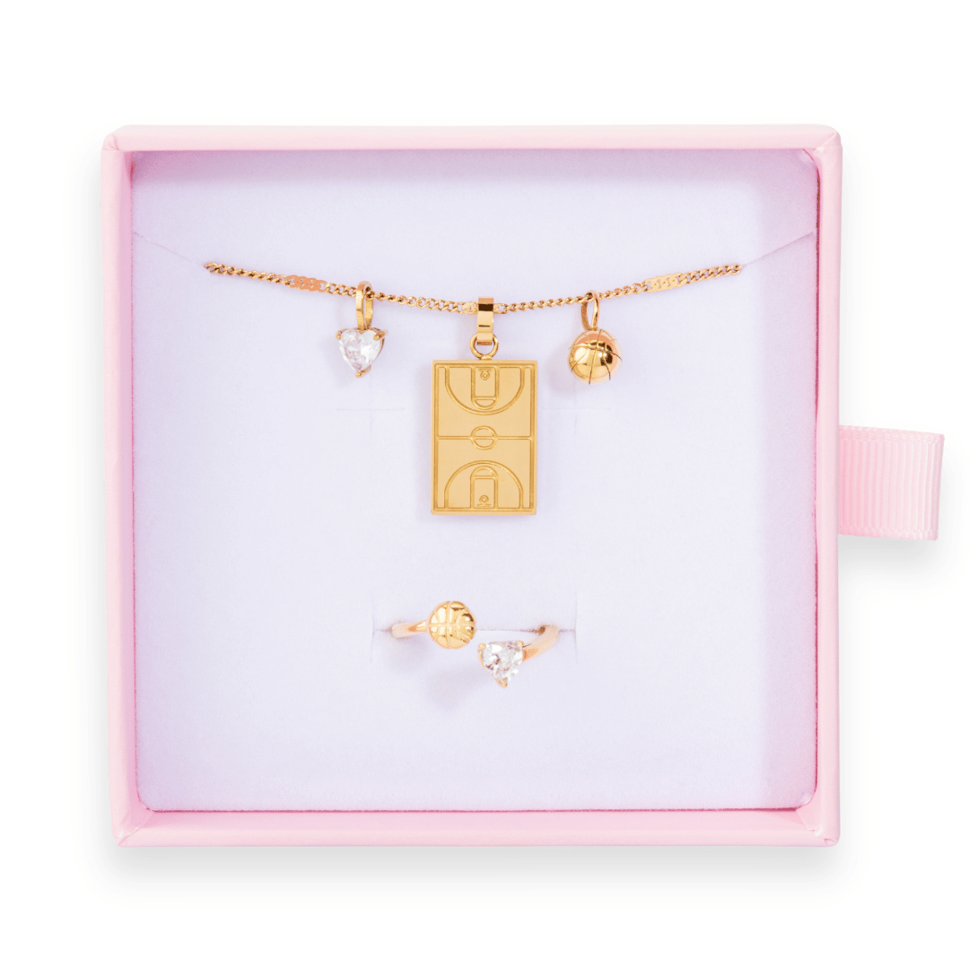 Gold Follow Through bundle with Home Court basketball necklace, and diamond basketball ring in pink gift box